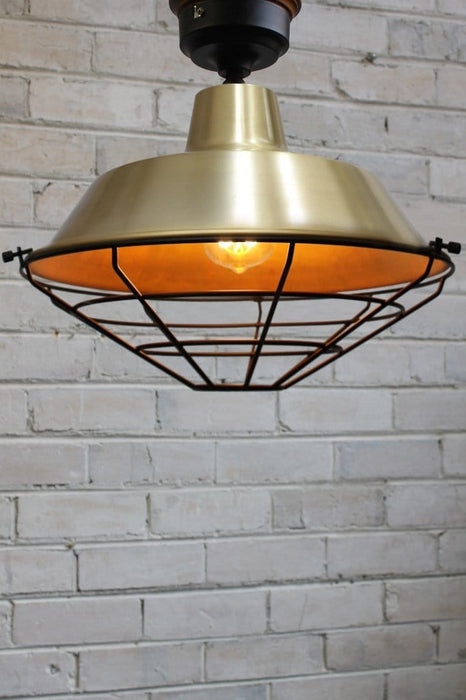 Bright brass flush mount with cage guard