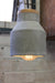 Small concrete timber pendant with protruding bulb