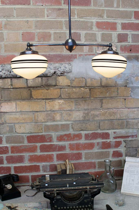 Two light pendant light with two stripe opal shades