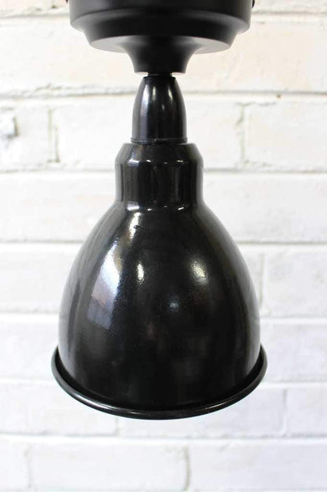 Brasserie batten lights are french inspired in black enamel and ideal ideal in open living spaces as well as any room with lower ceilings.