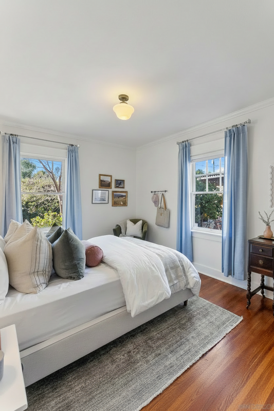 Small opal schoolhouse chelsea shade on a gold/brass batten holder and gallery in bedroom