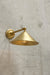 Gold/brass steel arm wall light with gold/brass steel shade