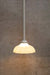 Glass shade with a white pole pendant
