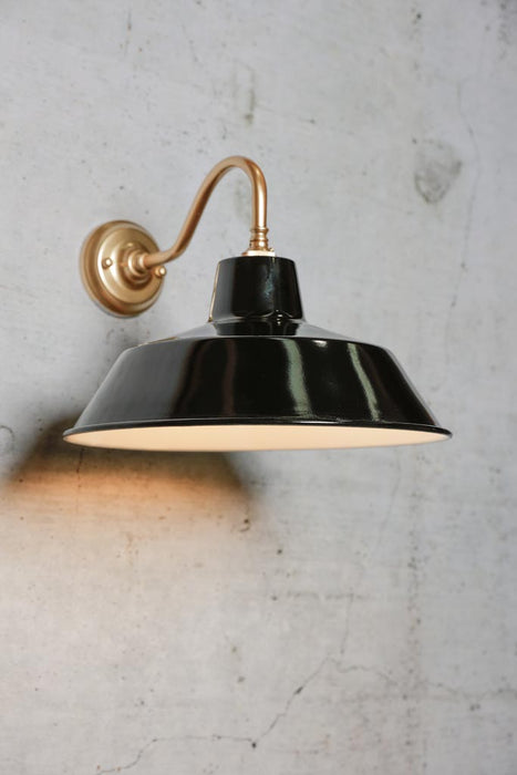 Gold gooseneck wall light with black shade