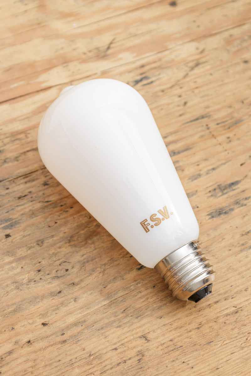 E27 dimmable led filament light bulb. create atmospheric lighting. Opal finish. Low energy consumption.