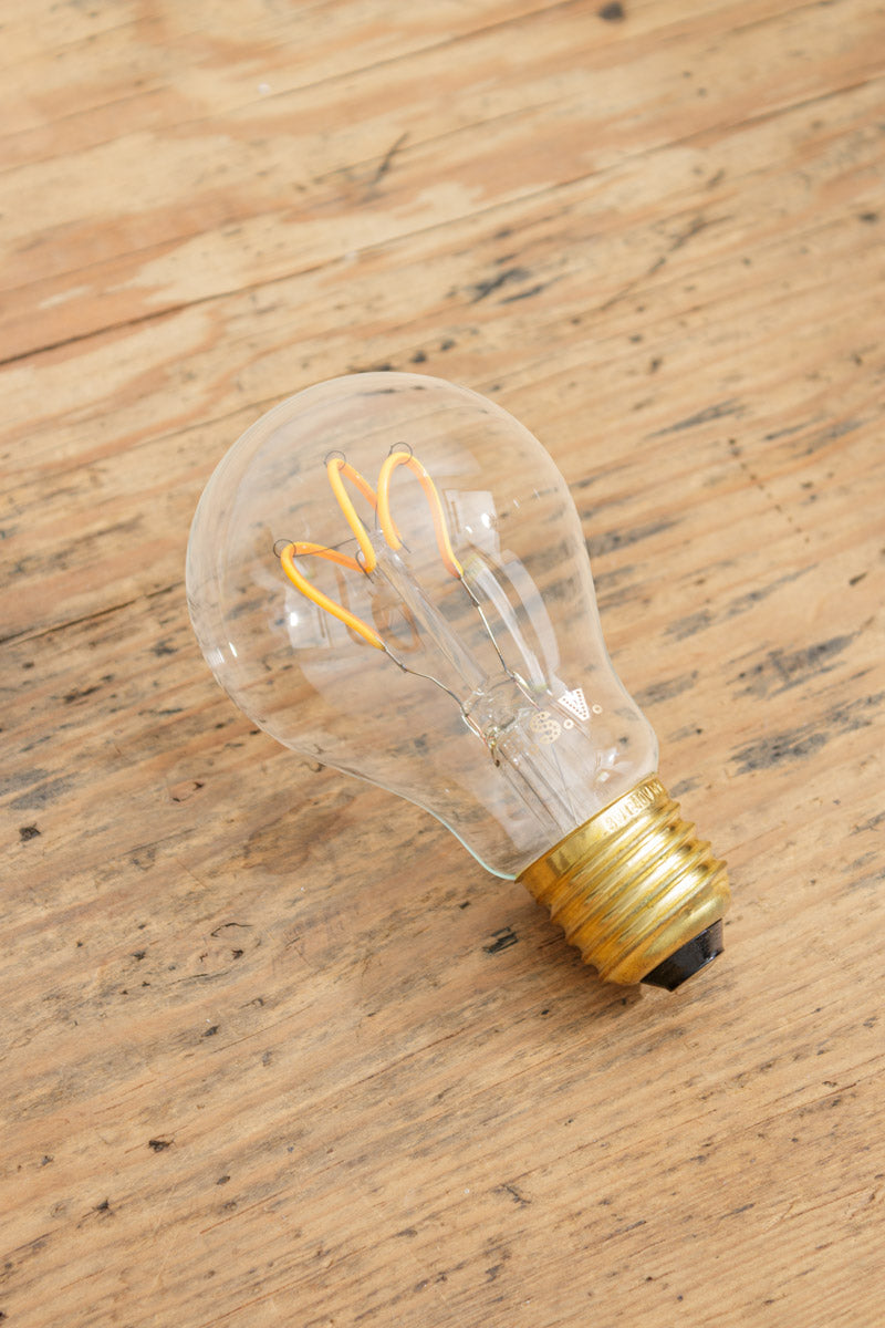 Clear glass A60 bulb with a tri loop LED element and an E27 base. 