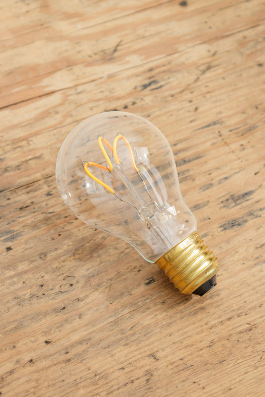 Clear glass A60 bulb with a tri loop LED element and an E27 base. 