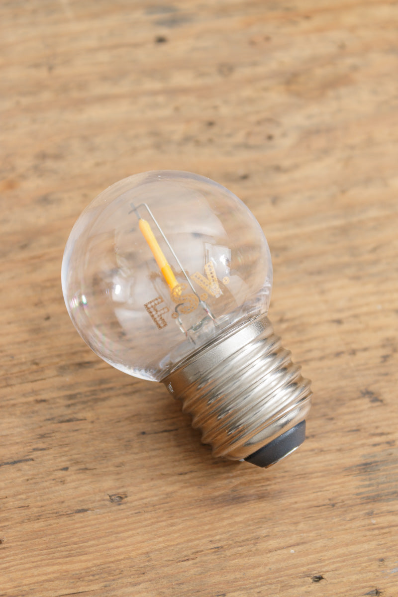 Clear glass G45 bulb with LED element and an E27 base. 