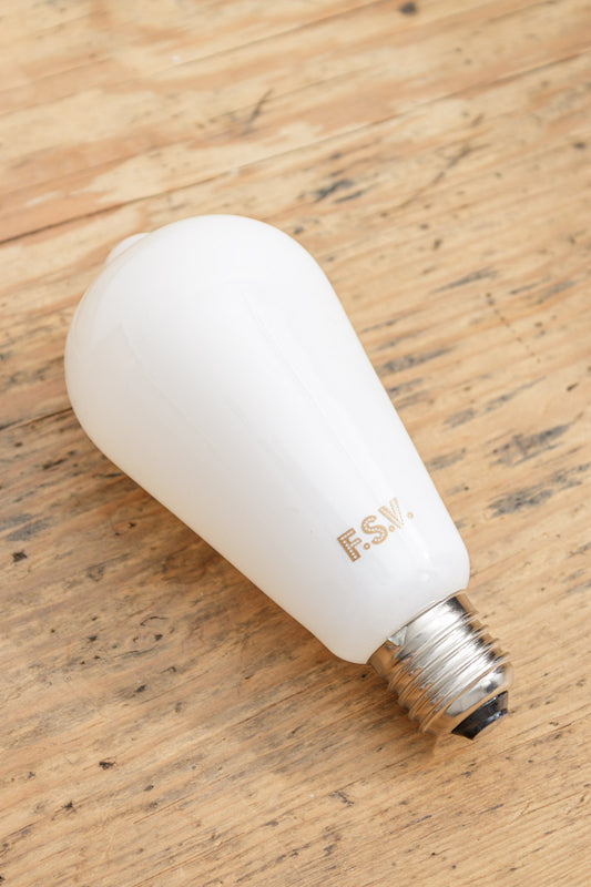 12W opal glass tearfrop bulb with LED filaments and an E27 base. 