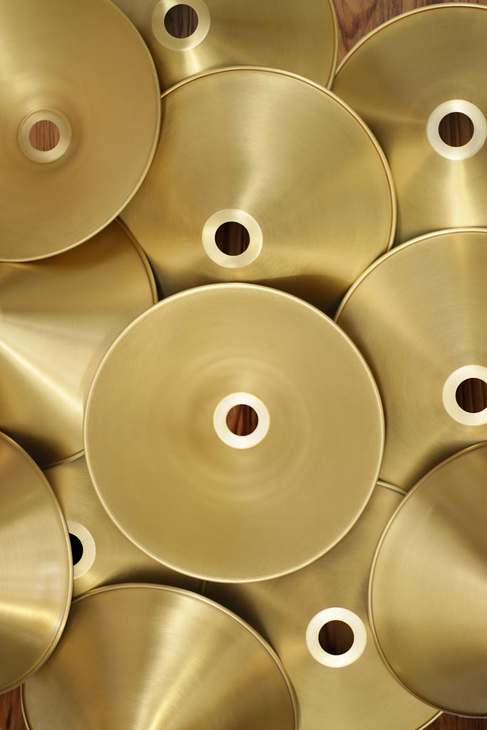 Bright brass cone shades. 