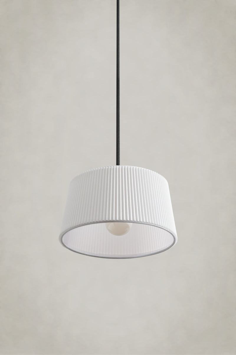 small white Pleat Penant light on black cord.