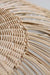Close-up of the natural rattan material used for the shade.