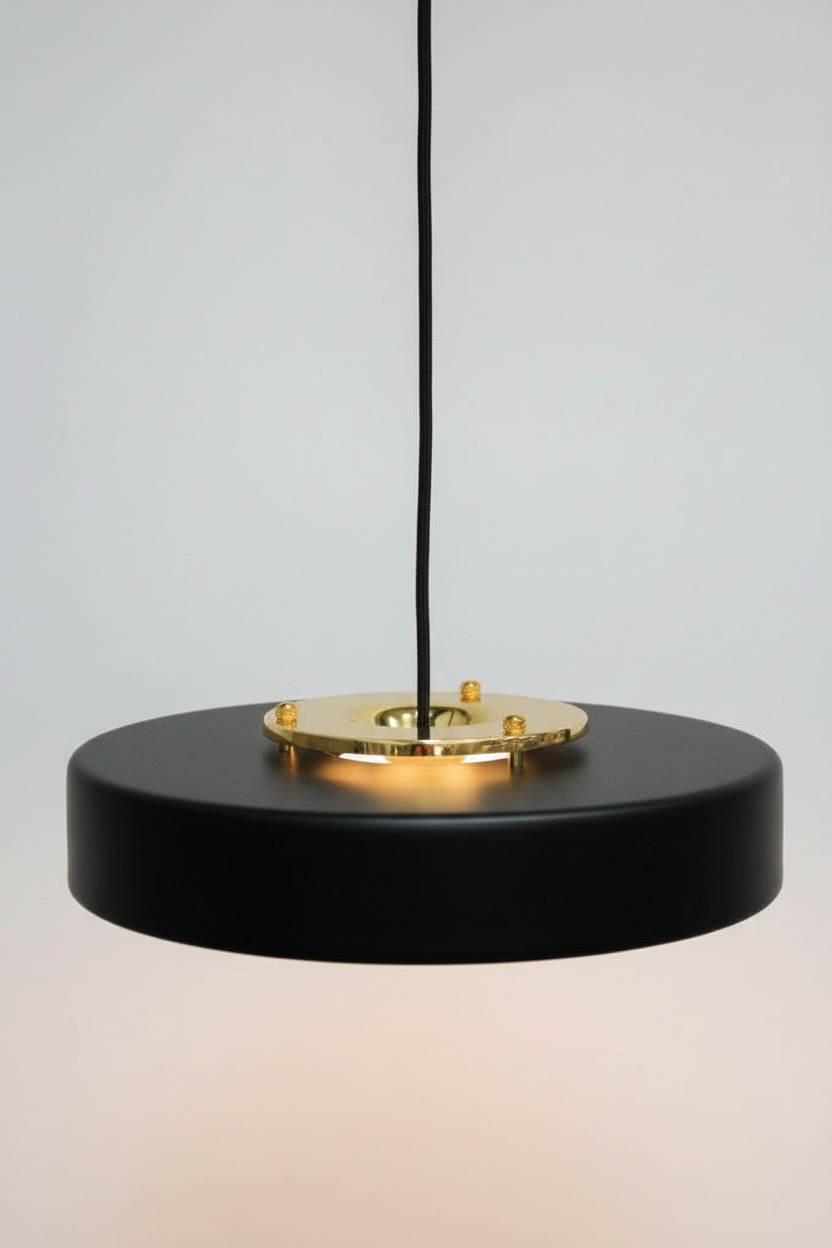 Black finish shade and gold/brass metalware on pendant light