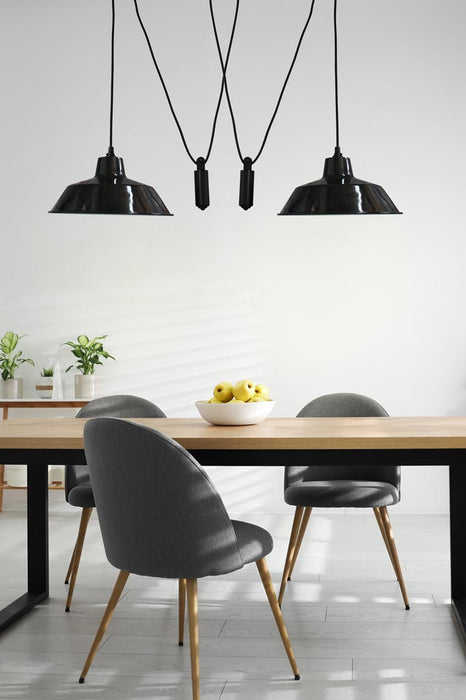 2 Factory Pulley Pendant Lights over dining table