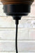 black ceiling rose with mounting block