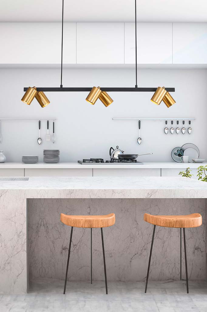 Spotlight pendant with six lights in gold/brass finish over the kitchen island.