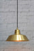 Bright brass pendant light with round gold cord