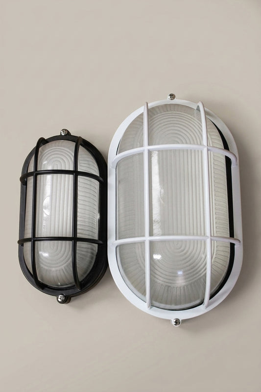 Oval cagaed bunker light small black and large white variations. 
