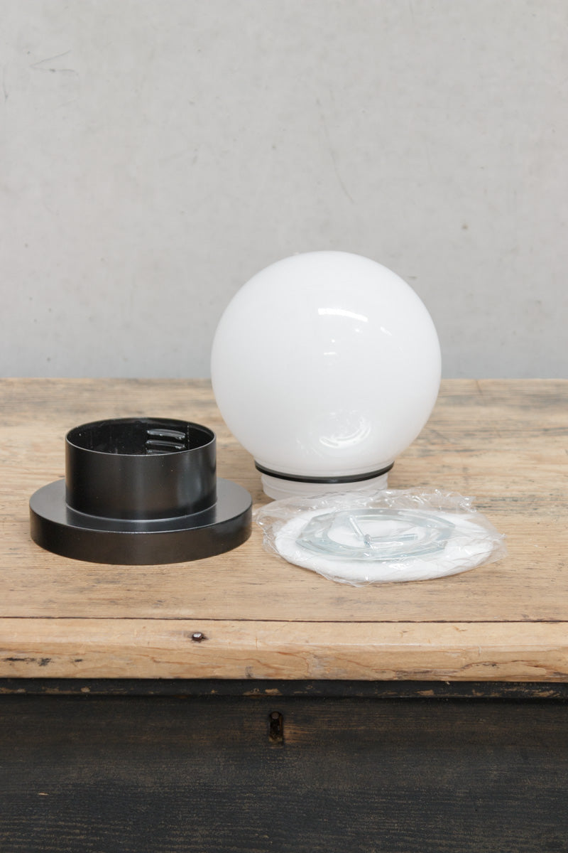 Bunker globe light bayonet b22 fitting in black with opal glass shade. 