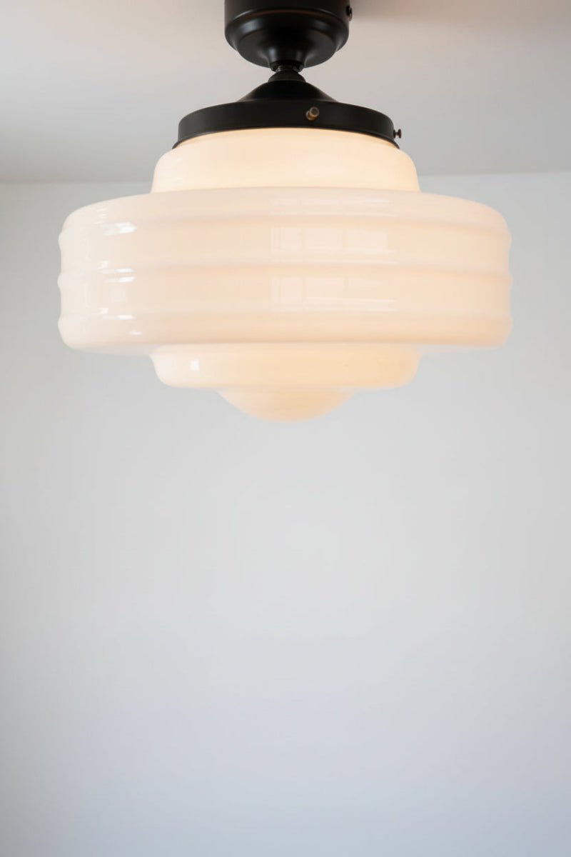 Schoolhouse flush mount in large size with black sconce