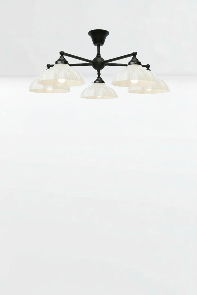 5 arm adjustable flush mount light with five opal glass shades. 