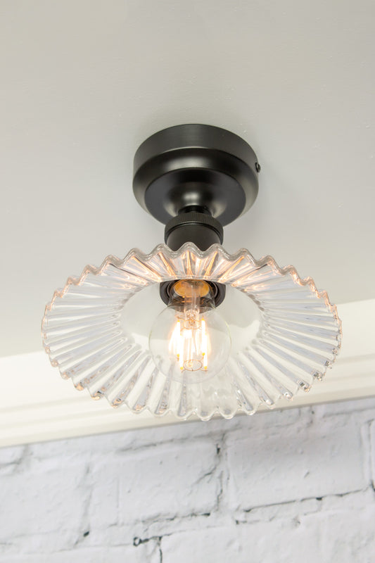 glass ceiling light with black batten holder