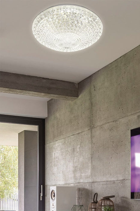 Large variant flush mount light affixed on bathroom ceiling