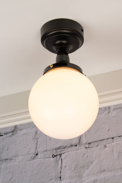 Ceiling light with small opal shade