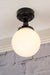 Ceiling light with small opal shade
