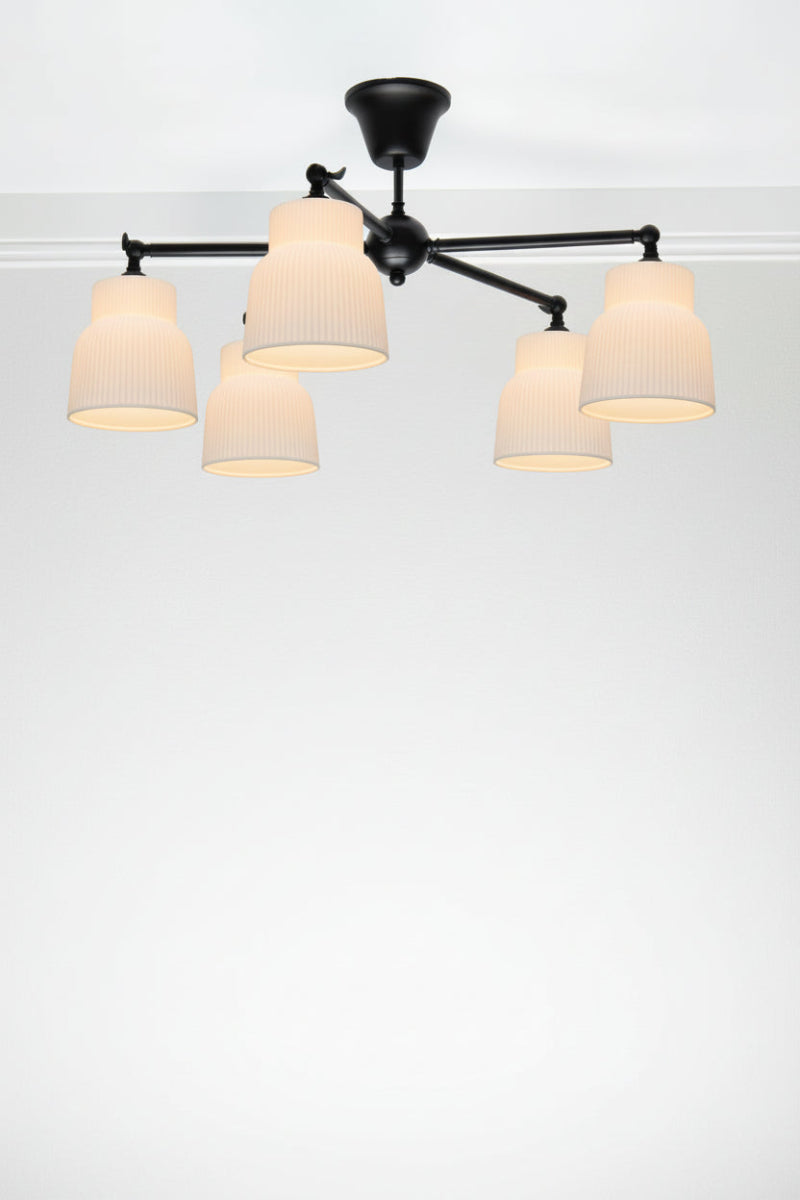 Black straight arm 5 light flush mount with white ceramic shades