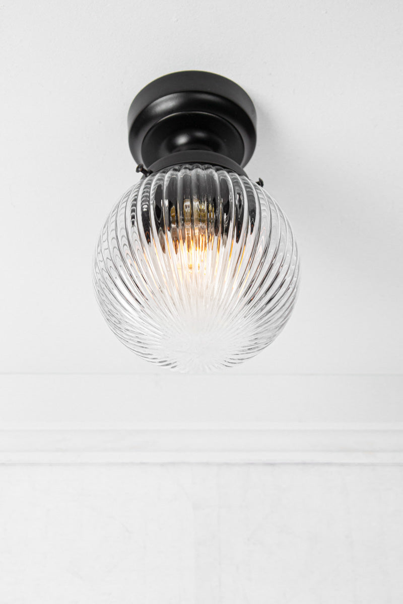 Clear reeded glass ball batten light with black metalware
