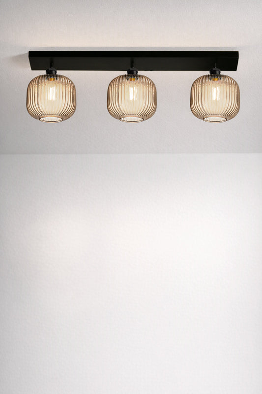 Balmain Reeded Glass 3 Light Flush Mount with amber glass shades and black ceiling mount