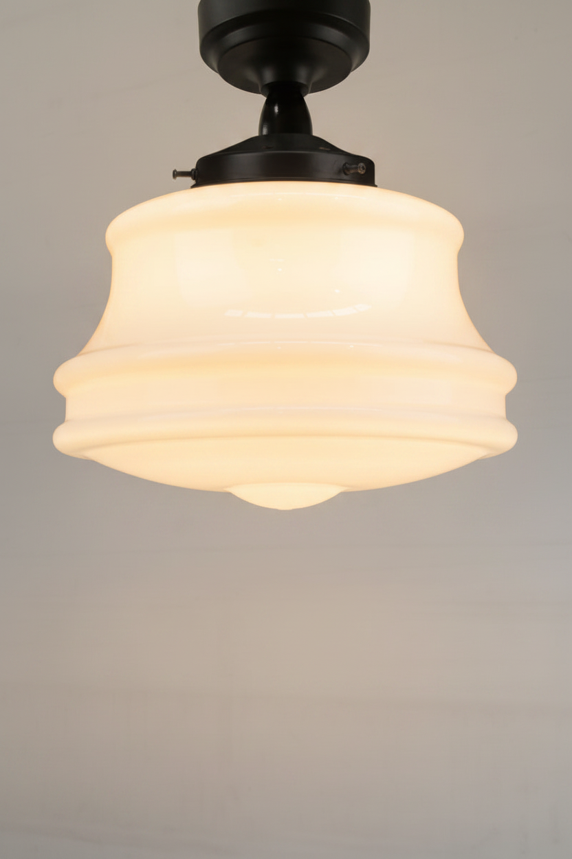 Large handmade opal glass shade casts a soft, even diffused light