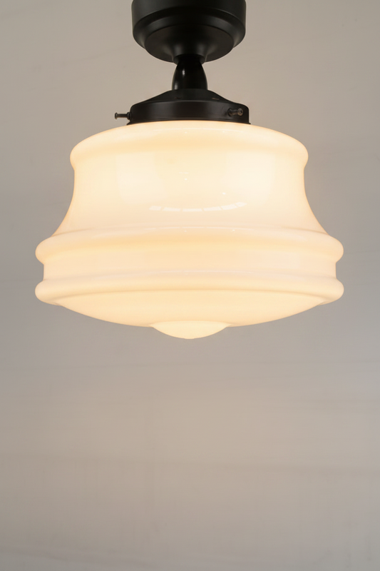 Large handmade opal glass shade casts a soft, even diffused light