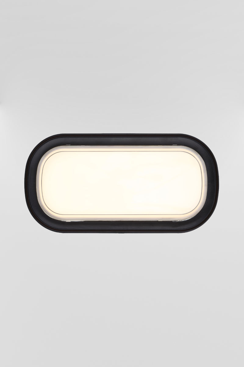 Front view of the black framed polycarbonate rectanguler bunker light. 
