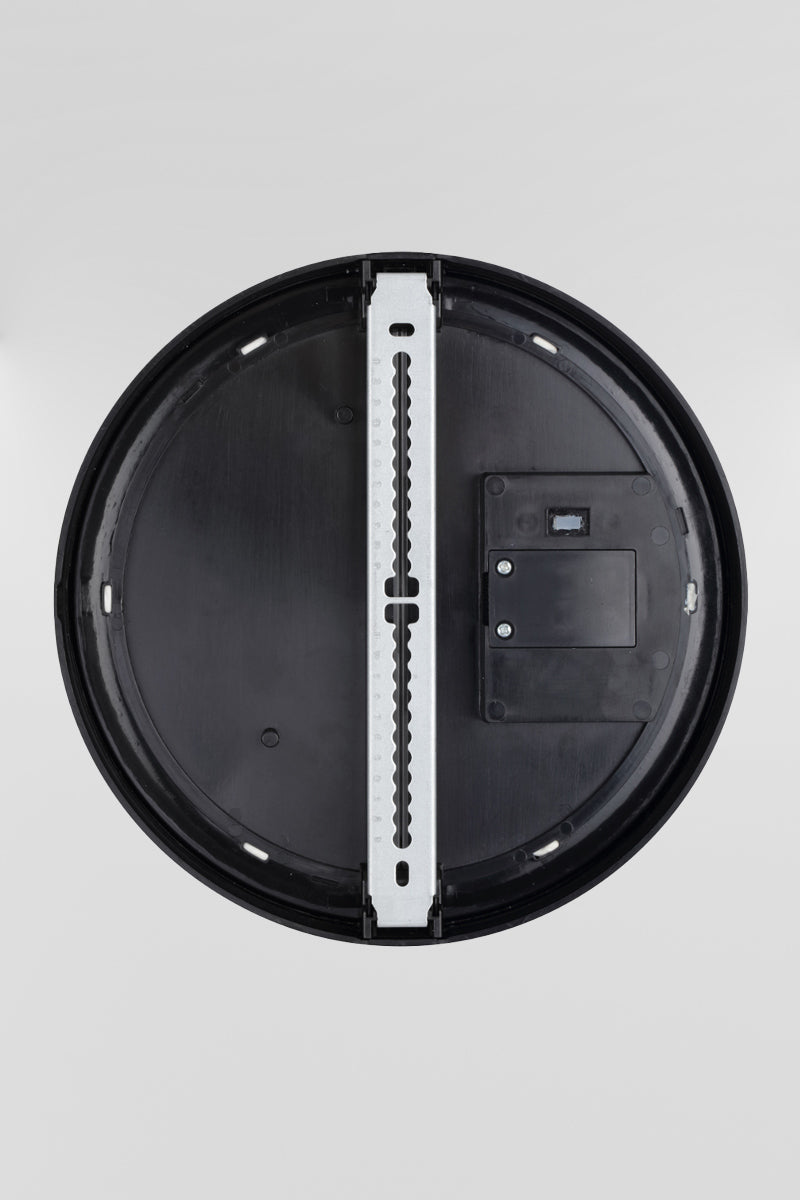 Back view of the round polycarbonate bunker light with black frame and LED light source. 