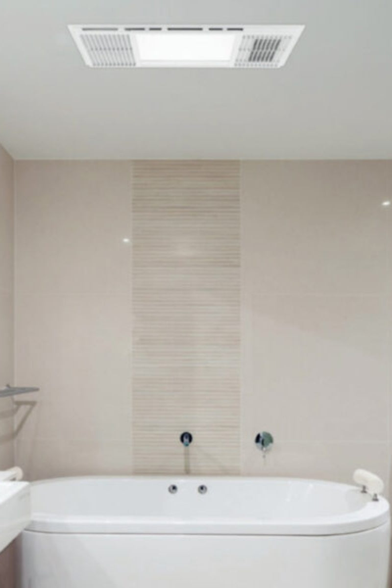 3 in 1 LED light, heater and exhaust fan in a cream and white bathroom