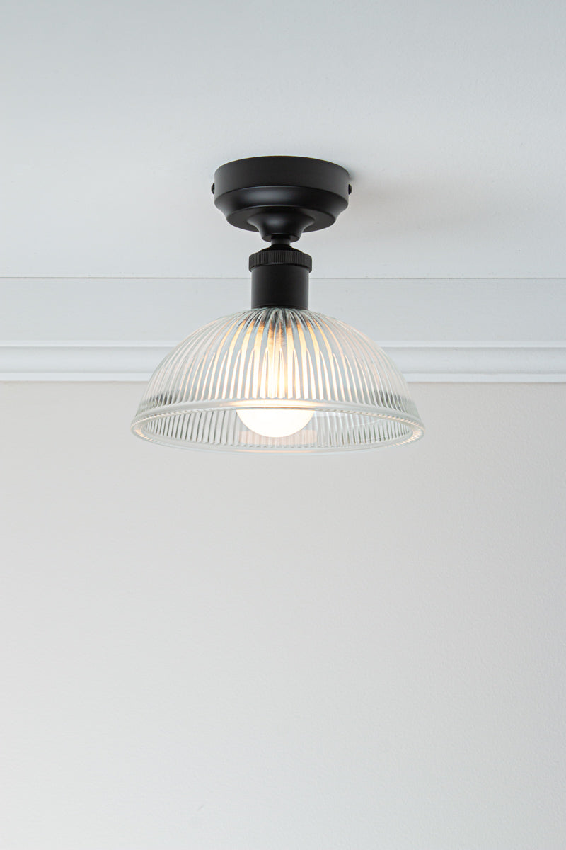 Small Garda Glass Ceiling Light with clear ribbed glass shade and black ceiling fixture