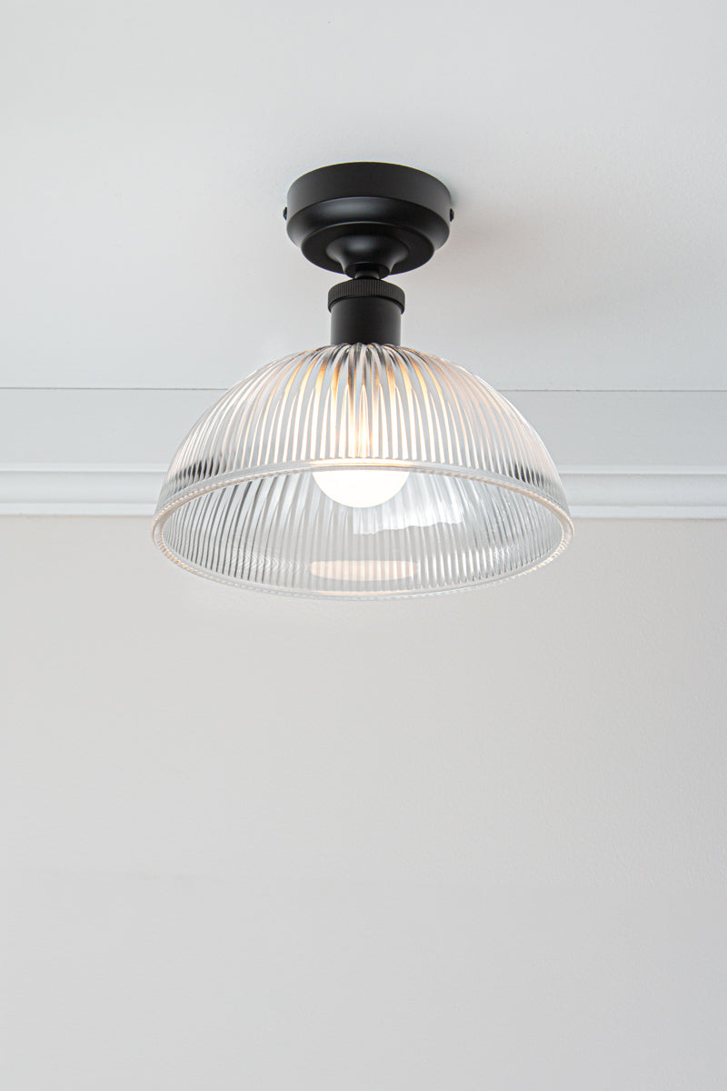 Medium Garda Glass Ceiling Light with clear ribbed glass shade and black ceiling fixture