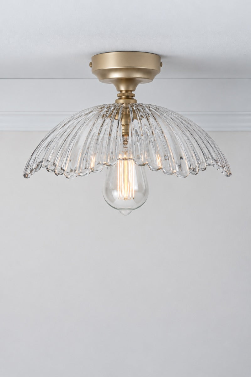 Hepburn Glass Ceiling Light with a gold/brass batten holder on a white ceiling. 
