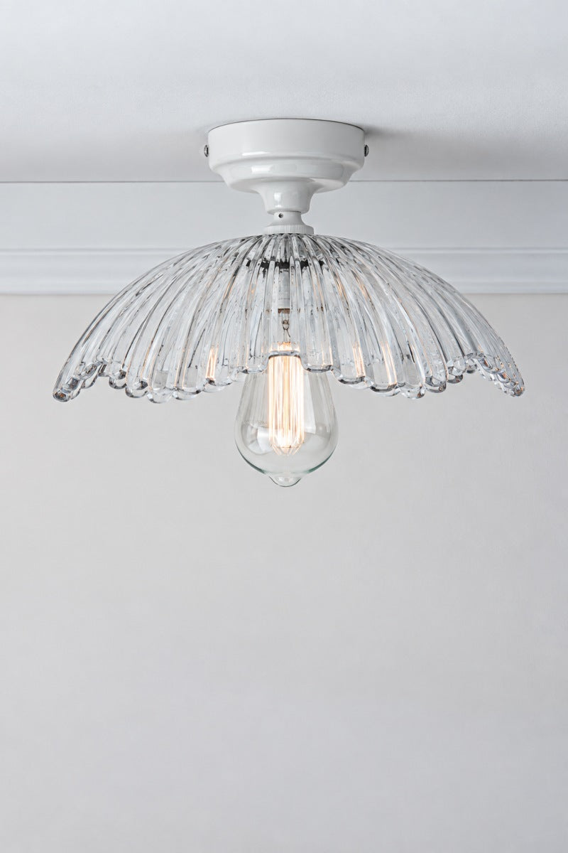 Hepburn Glass Ceiling Light with a white batten holder on a white ceiling. 