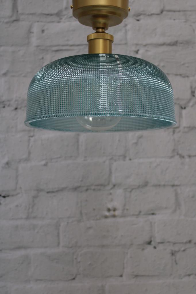 blue shade on gold brass fitting