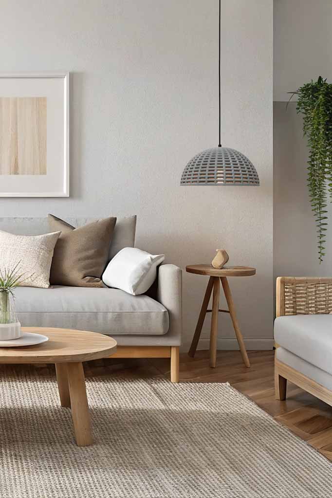 Concrete dome pendant above a table in living room 