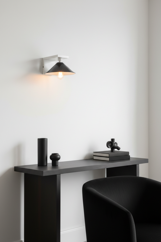 Modern interior with a black console table against a white wall, featuring a woode wall light in white with black shade