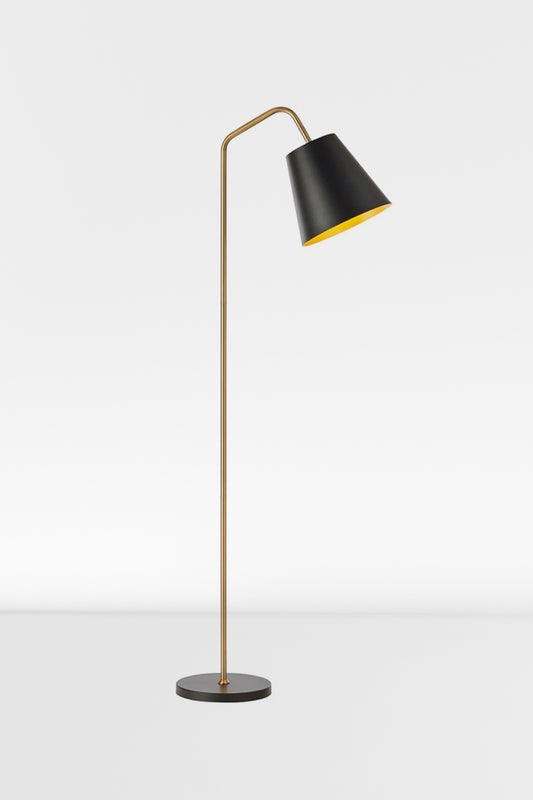 Mid century modern floor lamp with a matt black shade and base and a brushed gold stem.