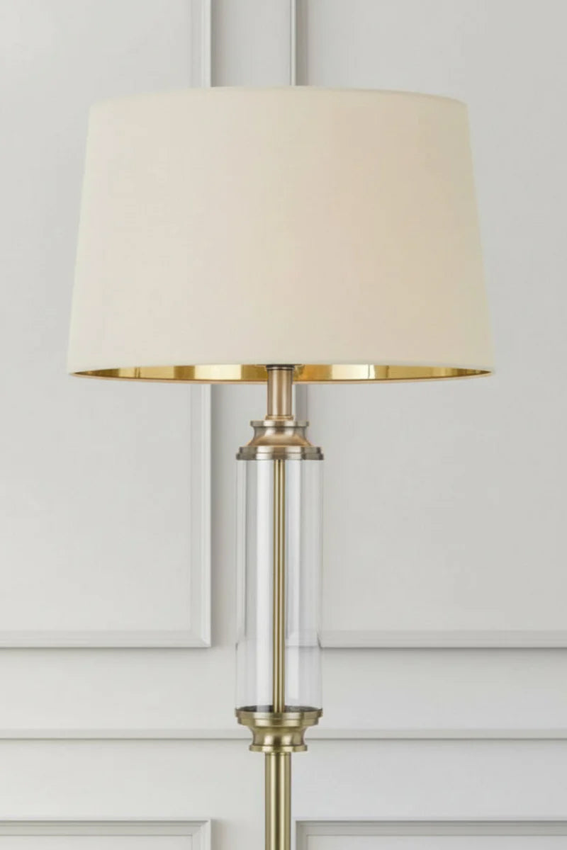 Brass finish glass floor lamp with cream shade