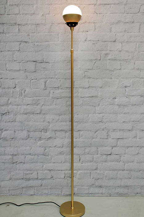 Crown sphere floor lamp with gold base, black gallery and gold shade