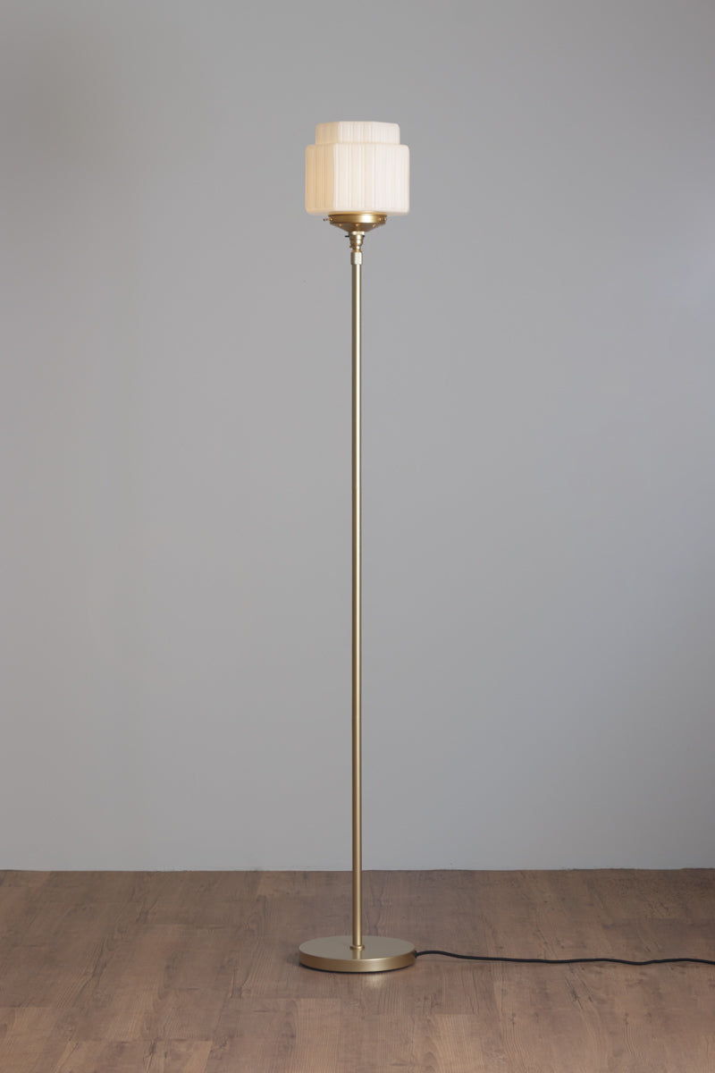 Gold/Brass stem floor lamp with an opal art deco inspired glass shade. 
