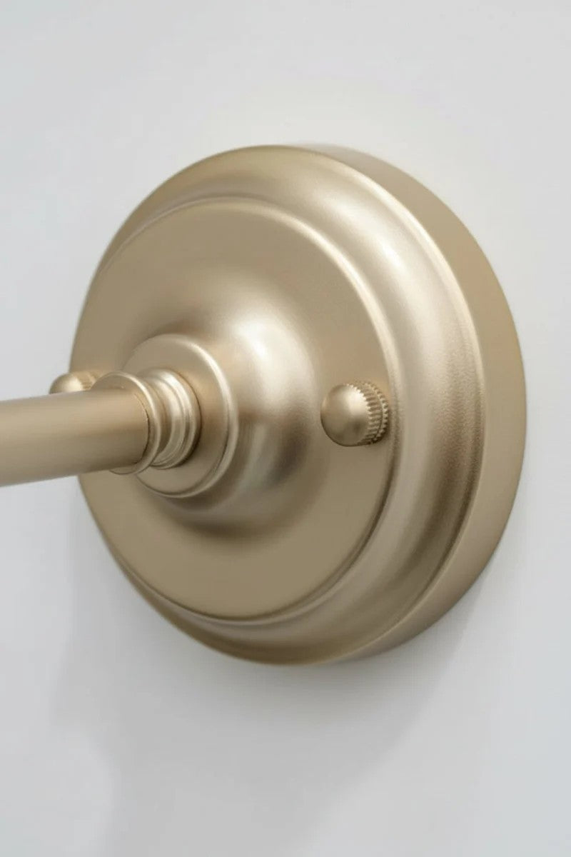 Close up of the gold/brass mount on wall sconce