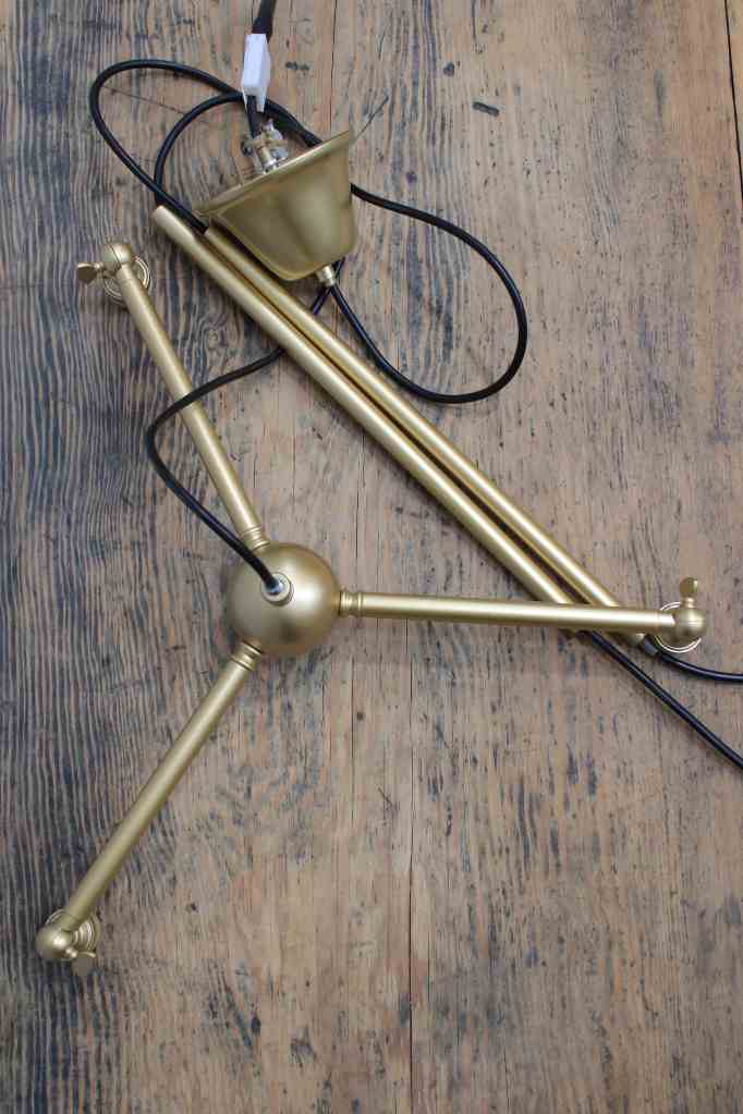 Gold steel chandelier is supplied with two poles in the box and with multiple arms 